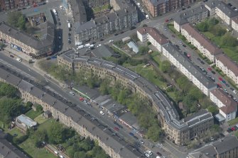 Oblique aerial view of Walmer Crescent, looking NW.