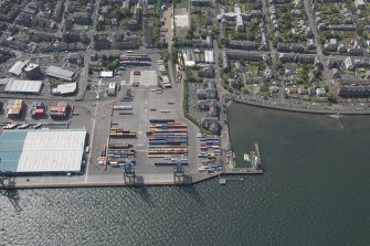 Oblique aerial view of Princes Pier and Seafield Drill Hall, looking SW.