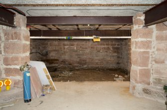 General view of lower floor East section showing area to be developed for toilets.