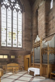 General view of organ and WC cubicle in North transept.