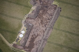 Oblique aerial view during excavation.