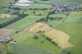 Oblique aerial view during excavation.