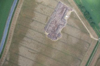 Oblique aerial view during excavation.