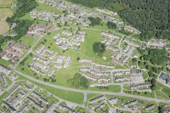 Oblique aerial view of Firhill, Alness.