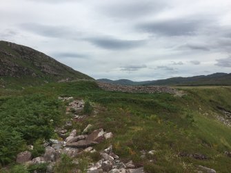 General view along the SE side of the lower enclosure towards the upper enclosure.