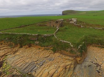 Oblique aerial view of Breckness House, and part of the broch.