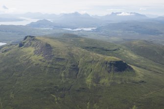 Oblique aerial view of Ben Dearg with Portree and the Cullins beyond.