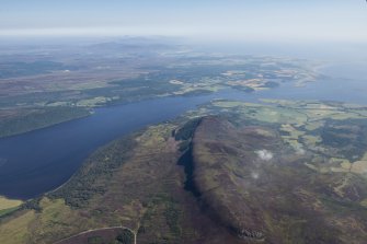 Oblique aerial view of Struie Hill with the Dornoch Firth beyond.
