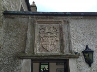 The 17th century armorial panel from Breckness House, now above the E entrance to Skaill House.