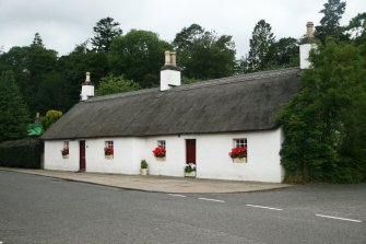 General view of thatched cottage, 1 and 3 Main Street, Glamis.
