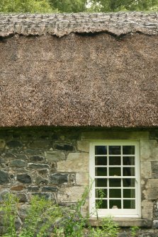 Detail of thatching along ridge; restored thatched cottage, Craigengillan, Glessel.