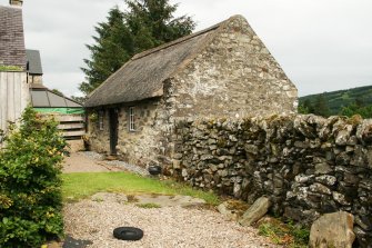 View of restored 18th century bothy with thatched roof; Nether Tullicro, Dull.