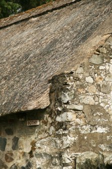 Detail of corner thatching and ridge on 18th century bothy; Nether Tullicro, Dull.
