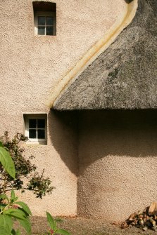 Detail of cottage showing concrete edge between main block and roof of the wing; Norman Cottage, Mellerstain House.
