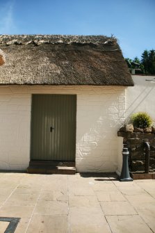 View of larder building showing damage to ridge;  Souter's Inn 
( the Shanter Hotel), Kirkoswald.