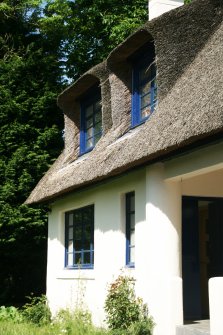 Side view of cottage showing overhang around dormer windows; Newlands Place, East Kilbride.