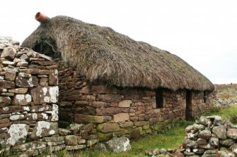 View of surviving thatched cottage, mains of Applecross.
