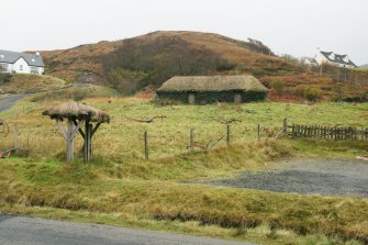 Distant view of late 19th century croft house; Colbost no 1, Croft Museum, Skye.