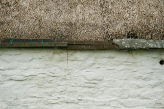 View of eaves  showing stone and concrete slabs; Laidhay Croft Museum.