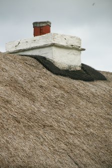 View of roof ridge around chimney stack; Laidhay Croft Museum.