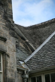 Detail of roof junction showing netted thatch;  Barony House, Lasswade