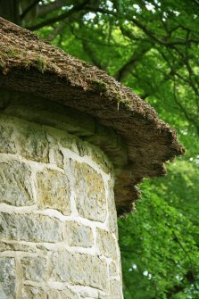 Detail of circular stonework below thatched roof; ' Mary's Bower',  Newhall House, Habbie's Howe.
