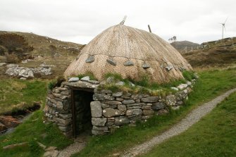  View of  thatched mill building and doorway; Horizontal Click Mill, South Shawbost, Lewis.