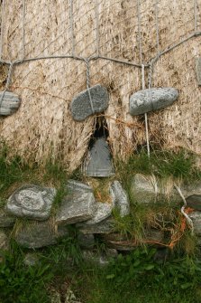 Detail of thatch with stone weights;  Horizontal Click Mill, South Shawbost, Lewis.