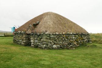 View of thatched outbuilding; Reumisgarry, North Uist.