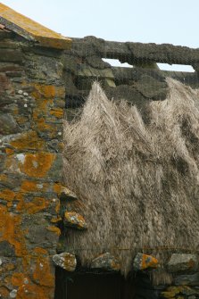 Detail of roof with remaining damaged thatch; Baile, Berneray.