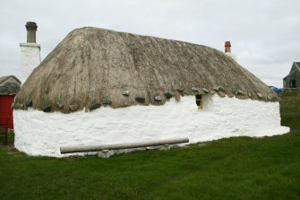 Rear view,modernised probable 18th century thatched cottage; Struan Ruadh, Malaclete.