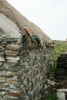 Detail of eaves on thatched outbuilding;Struan Ruadh cottages, Malaclete.