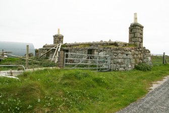 View of roofless ruin, formerly 19th century thatched cottage with outbuildings ( now no longer visible); North Smerclate, South Uist.