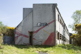 Accommodation block. View of graffiti art by Remi/Rough and Stormie Mills from north west.