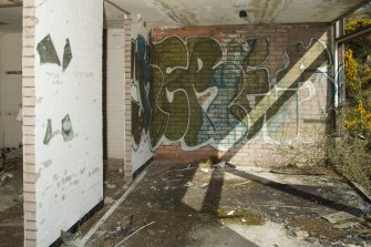 Accommodation block. View of graffiti art from north west.