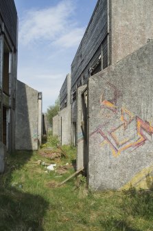 Accommodation block. View of graffiti art by Derm from south.