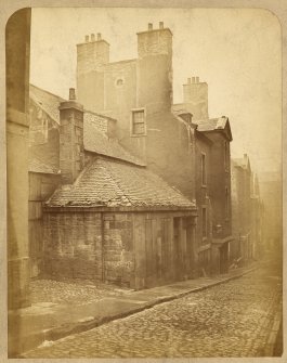 View of houses on West side of Horse Wynd, Edinburgh, prior to demolition.

