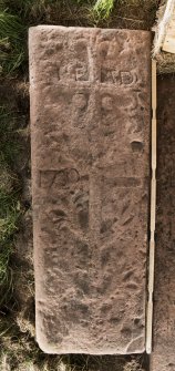 View of medieval recumbent grave slab Kirkmichael 2 (with scale).
