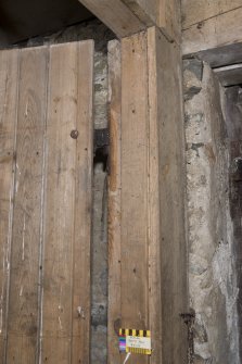 South mill. Ground floor. Byre. Detail of graffiti on east door jamb.