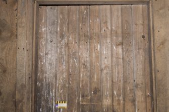 South mill. Ground floor. Stable.  Detail of graffiti on south face of door.