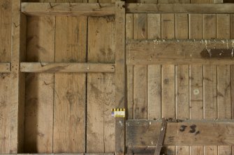 South mill. Ground floor. Detail of graffiti on door surround.