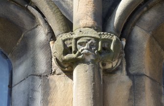 Detail of grotesque carvings on east front.