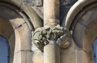 Detail of grotesque carvings on east front.