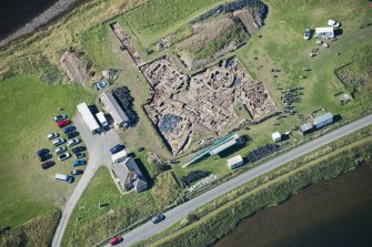 Oblique aerial view of excavation at Ness of Brodgar.