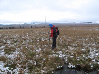 Mr G Geddes surveying the stone circle with GNSS.