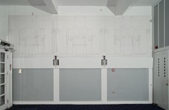Ground floor, front saloon, view of 3 plaster panels on east wall