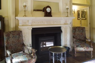 Ground floor. Entrance hall fireplace from south east.