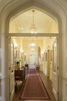 Ground floor. Entrance hall. View along drawing room passage from east.