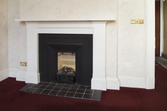 Interior. First floor. Detail of fireplace in Jury room.