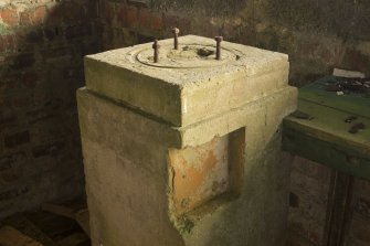 Battery Observation Post, ground floor room, detail of mounting bolts on top of rangefinder plinth.